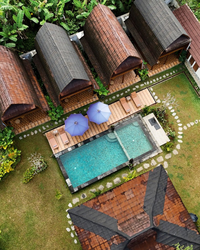 Aerial view of Yama Villa & Spa Ubud villas, swimming pool and garden in Payangan Bali