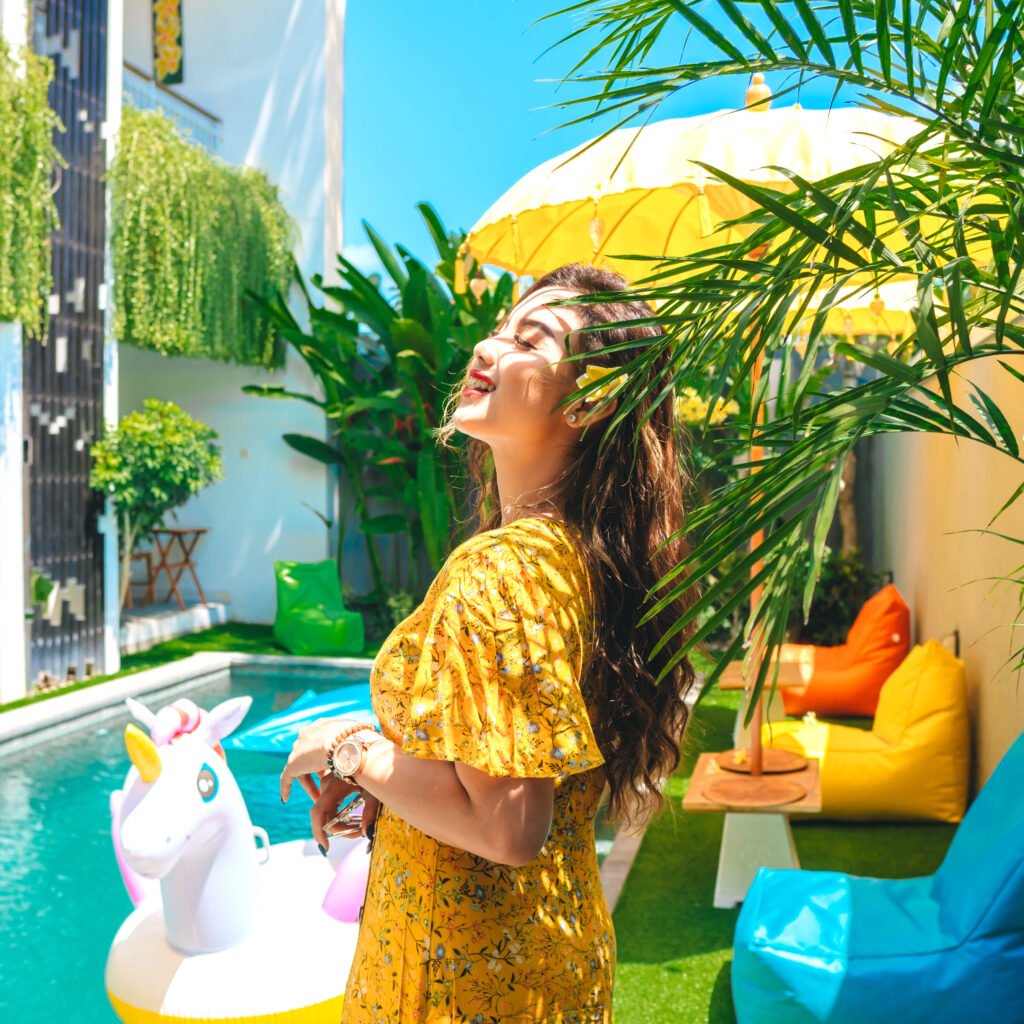 Guest enjoying the pool at Bahana Guest House Bali
